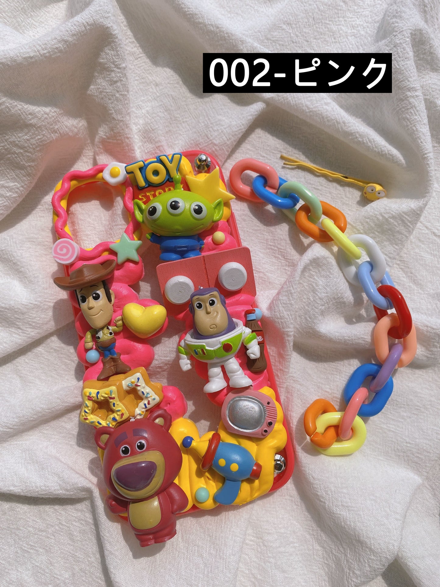 OL トイ・ストーリー バズ・ライトイヤー スリーアイズ ストロベリーベア ミルクホイップ携帯ケース